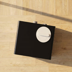 Top view of Kryo Air compact black chiller on a wooden floor of wellness center
